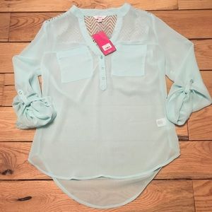 Candie’s sheer blouse